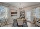 Bright dining area with a round table and four chairs, near a door at 5150 Longview Run, Decatur, GA 30035