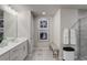 Double vanity bathroom with a large shower and elegant decor at 5150 Longview Run, Decatur, GA 30035