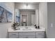 Modern bathroom with white vanity, quartz countertop, and large mirror at 5150 Longview Run, Decatur, GA 30035