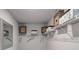 Large walk-in closet with custom shelving and mirrored doors at 5150 Longview Run, Decatur, GA 30035