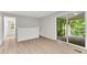 Dining area with hardwood floors and access to a screened porch at 4028 Creel Dr, Lithia Springs, GA 30122