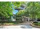 Modern building with landscaped entrance at 3338 Peachtree Ne Rd # 1106, Atlanta, GA 30326