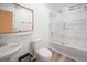 Clean bathroom with a glass-enclosed shower and bathtub at 20 Marietta Nw St # 3G, Atlanta, GA 30303