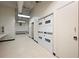 Well-lit laundry room with several washers and dryers at 20 Marietta Nw St # 3G, Atlanta, GA 30303