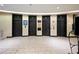 Bank of elevators with tiled floor at 20 Marietta Nw St # 3G, Atlanta, GA 30303