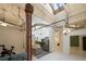 Open living area with exposed brick, high ceilings, and an industrial feel at 20 Marietta Nw St # 3G, Atlanta, GA 30303