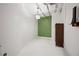 Simple bedroom with green accent wall and good closet space at 20 Marietta Nw St # 3G, Atlanta, GA 30303