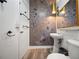 Stylish bathroom with pedestal sink and modern fixtures at 20 Marietta Nw St # 3G, Atlanta, GA 30303