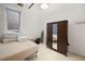 Bright bedroom with large window and ample closet space at 20 Marietta Nw St # 3G, Atlanta, GA 30303