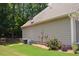 Rear house exterior with AC units and landscaping at 40 Templeton Ln, Villa Rica, GA 30180