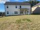 Spacious backyard with a covered patio at 4430 Vernon Nw St, Lilburn, GA 30047