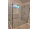 Large walk-in shower with glass enclosure and tile surround at 4430 Vernon Nw St, Lilburn, GA 30047