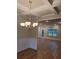 Elegant dining room with chandelier and hardwood floors at 4430 Vernon Nw St, Lilburn, GA 30047