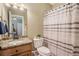 Small bathroom with granite vanity and shower at 341 Allendale Dr, Canton, GA 30115