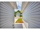 View through the side yard, showcasing a neighboring home and driveway at 4084 Waldrop Hills Dr, Decatur, GA 30034