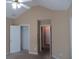 Primary bedroom with access to additional rooms and closet at 435 Victoria Blvd, Oxford, GA 30054