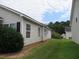 House exterior showcasing side yard at 435 Victoria Blvd, Oxford, GA 30054
