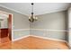 Simple dining room with hardwood floors and chandelier at 2990 Mountain Ne Trce, Roswell, GA 30075