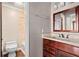 Bathroom boasts a vanity with granite countertop at 2990 Mountain Ne Trce, Roswell, GA 30075