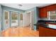 Bright breakfast nook with built-in shelving and access to deck at 2990 Mountain Ne Trce, Roswell, GA 30075