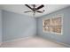 Charming bedroom with light blue walls and ceiling fan at 2990 Mountain Ne Trce, Roswell, GA 30075