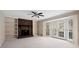 Living room features a stone fireplace and built-in shelving at 2990 Mountain Ne Trce, Roswell, GA 30075