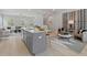 Modern kitchen island and stainless steel appliances at 77 Werner Brook Way, Atlanta, GA 30354