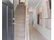 Entryway with staircase, hardwood floors, and art at 77 Werner Brook Way, Atlanta, GA 30354