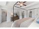 Main bedroom with a canopy bed, walk-in closet, and dresser at 77 Werner Brook Way, Atlanta, GA 30354