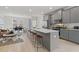 Open concept kitchen with island and stainless steel appliances at 77 Werner Brook Way, Atlanta, GA 30354