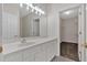 Bathroom features a white vanity and walk-in closet at 753 Camry Cir, Dallas, GA 30157