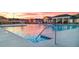 Inviting pool area with steps and handrail for easy access at 305 Silver Moon Dr, Loganville, GA 30052