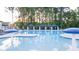 Community pool with three cabanas offering shade and relaxation at 305 Silver Moon Dr, Loganville, GA 30052