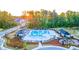 Community pool with multiple cabanas and playground at 305 Silver Moon Dr, Loganville, GA 30052