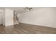 Spacious living room with hardwood floors and staircase at 305 Silver Moon Dr, Loganville, GA 30052
