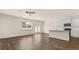 Open concept kitchen with island and hardwood floors at 305 Silver Moon Dr, Loganville, GA 30052