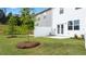 Private backyard with patio and trees at 305 Silver Moon Dr, Loganville, GA 30052