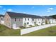 Townhomes with private fenced backyards and patios at 305 Silver Moon Dr, Loganville, GA 30052