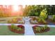 Landscaped area with a fire pit and seating for relaxing outdoors at 305 Silver Moon Dr, Loganville, GA 30052