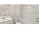 Clean bathroom with white bathtub, shower, and vanity at 305 Silver Moon Dr, Loganville, GA 30052