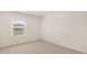 Spacious bedroom with neutral walls and carpet flooring at 305 Silver Moon Dr, Loganville, GA 30052