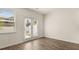 Bright dining room with hardwood floors and backyard access at 305 Silver Moon Dr, Loganville, GA 30052