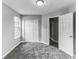 Well lit bedroom with grey walls, carpet and double door closet at 5452 Sweetsprings, Powder Springs, GA 30127