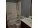 Bathroom with tub, toilet and vanity at 2211 Rocky Mill Dr, Lawrenceville, GA 30044