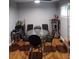 Small dining area with glass table and black chairs at 3665 Daisy Dr, Decatur, GA 30032