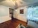 Light and airy entryway with wood floors and white wainscoting at 2606 Ramblewood Ct, Acworth, GA 30102