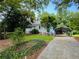 Cute ranch home with carport and lush landscaping at 2606 Ramblewood Ct, Acworth, GA 30102
