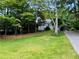 Charming ranch home with carport and landscaped yard at 2606 Ramblewood Ct, Acworth, GA 30102