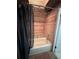 Subtle bathroom with a shower/tub combo and wood-paneled walls at 2606 Ramblewood Ct, Acworth, GA 30102