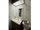 Small bathroom with a single sink vanity and tiled countertop at 2606 Ramblewood Ct, Acworth, GA 30102
